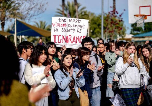Temecula, CA - December 16: Great Oak High School students leave campus on Friday, Dec. 16, 2022, in protest of the districts ban of critical race theory curriculum at Patricia H. Birdsall Sports Park in Temecula. (Photo by  Watchara Phomicinda/The Press-Enterprise via Getty Images)